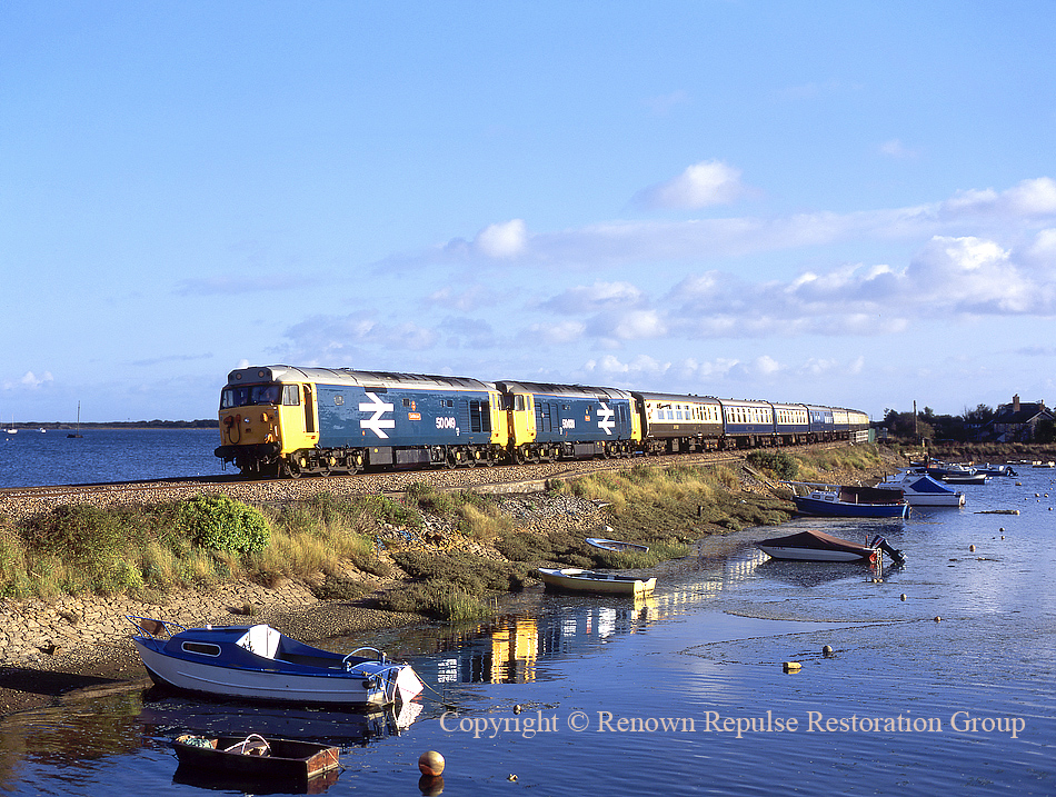 50049 and 50031 pass Cockwood Harbour with a railtour