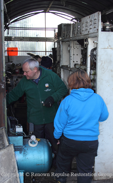 IMG_5880 andy and Julie working on spare cubicle 20121111 web copy