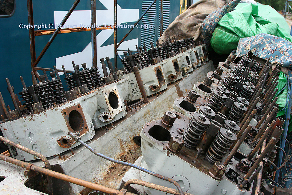 50008 power unit cylinder heads being fitted